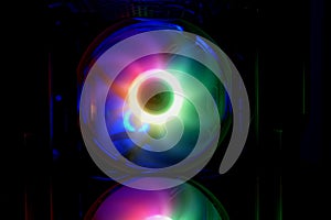 Colorful bright rainbow led rgb pc fan air case cooler. Computer chassis. Gaming modding, technology concept and IT background