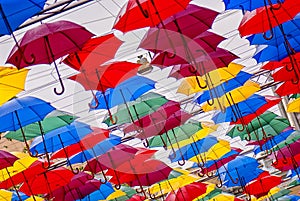 Colorful bright spots, umbrellas in the air