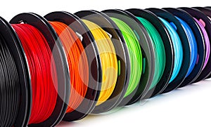 Colorful bright wide panorama row of spool 3d printer filament