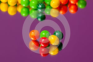 Colorful bubble gum spilling. Macro with shallow dof.