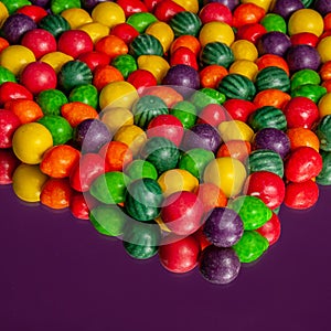 Colorful bubble gum spilling. Macro with shallow dof.