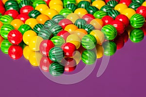 Colorful bubble gum spilling. Macro with shallow dof. photo