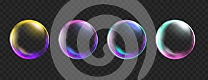 Colorful Bubbles isolated on black background. Realistic transparent neon soap bubble with glares. Shiny bright soapy