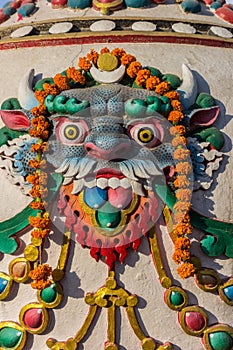 Colorful Buddhist sculpture at the Boudhanath stupa in Kathmandu