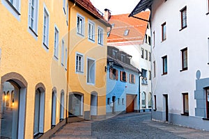 Colorful buildings along a street in historic Fussen, is a small town in, Germany photo