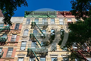 Colorful Buildings with Fire Escapes in Manhattan within New York City