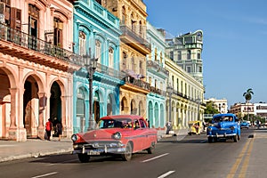Colorful buildings and old american car in Havana