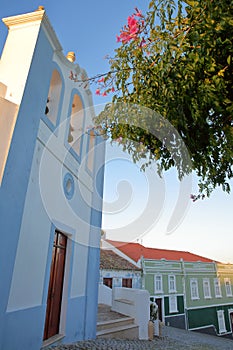 Colorful buildings in the old town of Aljezur with Misericordia church in the foreground, Costa Vicentina, Algarve