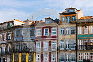 Colorful buildings in Porto, Portugal. Typical portuguese houses. Porto landmark. Multicolored exterior of buildings.