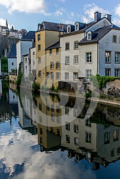 Colorful buildings reflecting in the Alzette - 3