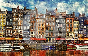 Colorful bulding and waterfront of Honfleur harbor in Normandy, France.