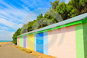 Colorful bungalows on the beach of Folkestone England