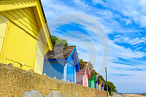 Colorful bungalows on the beach of Folkestone England