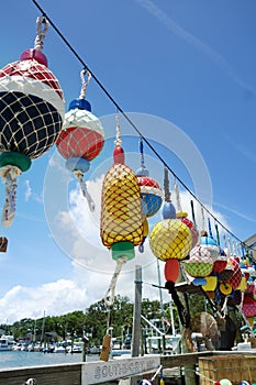 Colorful buoys hanging on a dock in Southport North Carolina photo