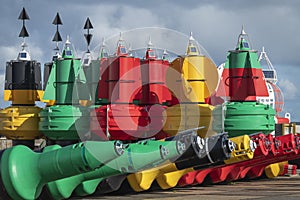 Colorful buoys in storage in a port