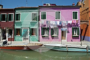 Colorful Burano Italy canal reflections