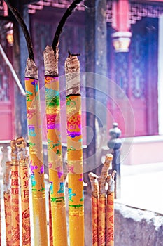 Colorful burning incense sticks at White Cloud taoist temple