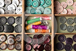 Colorful buttons in a box