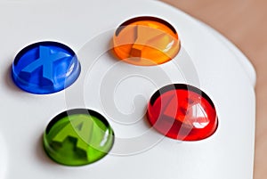 The colorful buttons on the gaming controller