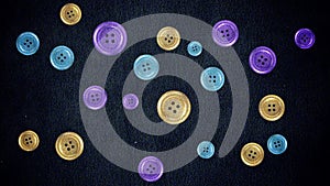 Colorful Buttons Moving on a Fabric in Stop Motion Style in Seamless Loop