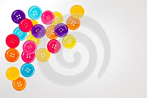 Colorful buttons on a whote background, template, copy space photo