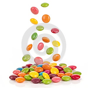 Colorful candies falling isolated on transparent background