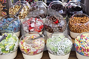 Colorful candies in glass bowls