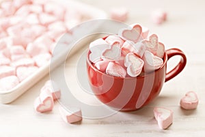 Colorful candies in heart shape. Valentines day background