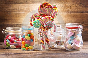 Colorful candies, jellies, lollipops, marshmallows and marmalade