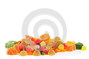 Colorful candies and jelly isolated on a white background