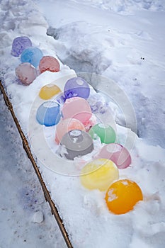 Colorful candle holders made of ice.