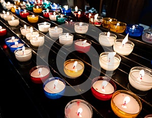 Colorful candles in church