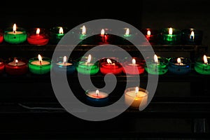 Colorful candles in a church