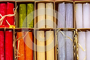 Colorful candles in festive packaging