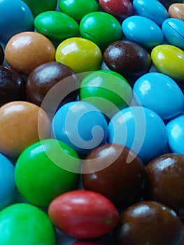 Colorful candy from chocolate. Its sweet teasty photo