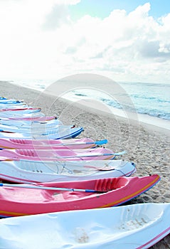 Colorful canoes in the beach