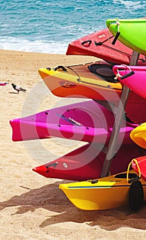 Colorful canoes on the beach of Lloret de Mar, Girona