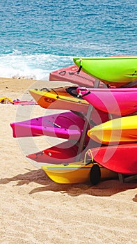 Colorful canoes on the beach of Lloret de Mar, Girona