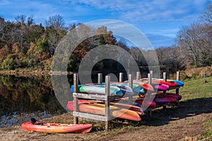 Colorful Canoes by a Lake