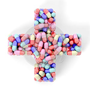 Colorful caplets in shape of medical cross