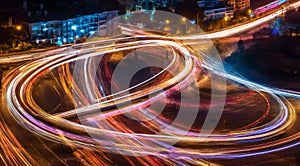 Colorful car light trails, long exposure photo at night, fantastic night scene, top view, a long exposure photo