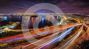 Colorful car light trails, long exposure photo at night, fantastic night scene, top view, a long exposure photo