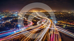 Colorful car light trails, long exposure photo at night, fantastic night scene, top view, a long exposure photo