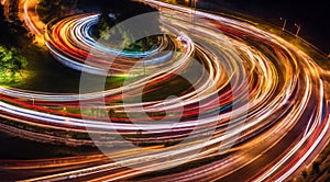 Colorful car light trails, long exposure photo at night, fantastic night scene, top view, a long exposure photo