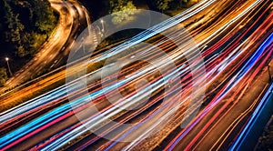 Colorful car light trails, long exposure photo at night, fantastic night scene, top view, a long exposure photo