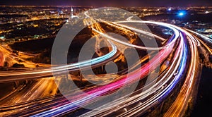 Colorful car light trails, long exposure photo at night, fantastic night scene, top view, a long exposure photo