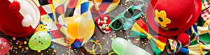 Colorful carnival banner with party accessories