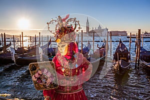 Colorful carnival mask at a traditional festival in Venice, Italy