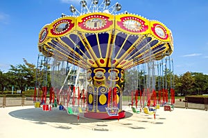 Colorful carousel in atraction park