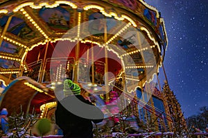 Colorful carousel on the Christmas fair